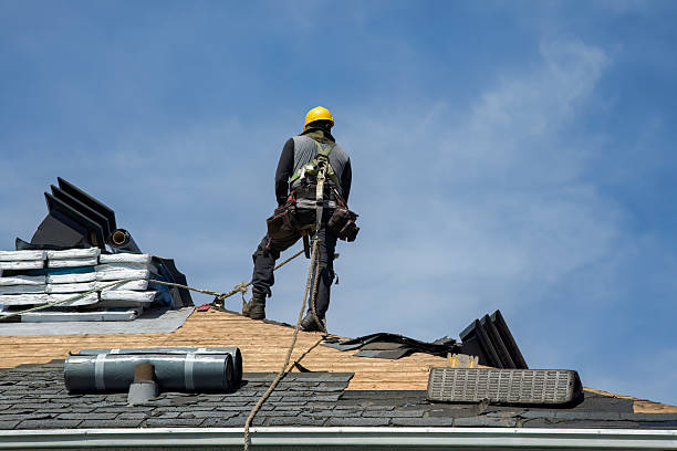 Professional Roofing technician working in Stayton, OR